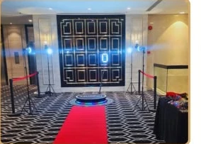 Exclusive 360 booth setup with platform, red carpet and queue stands